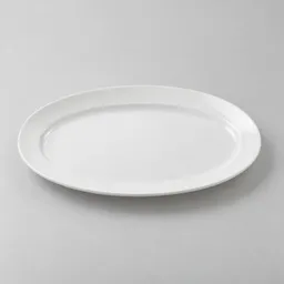 Plain white oval ceramic serving platter photographed centered on a light neutral background.