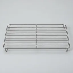 Centered stainless steel rectangular cooling rack with raised feet on a neutral light background.