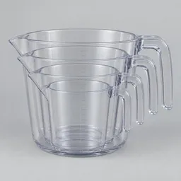 Centered nested set of four clear measuring cups with handles on a neutral light background.