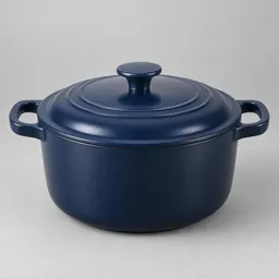 Centered studio photograph of a deep navy 5-quart Dutch oven with matching lid and side handles on a neutral light-gray background.