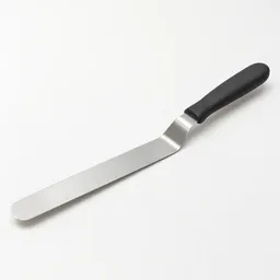 Centered unbranded offset spatula with a thin stainless-steel blade and angled neck on a neutral light background.