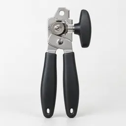 Centered manual can opener photographed against a plain light neutral background.