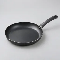 Centered 12-inch black nonstick skillet photographed on a neutral light background.