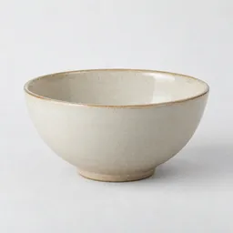Centered realistic studio photograph of a plain ceramic serving bowl on a neutral light background.