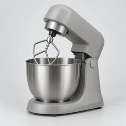 Centered electric stand mixer with a metal bowl on a pale gray studio background.
