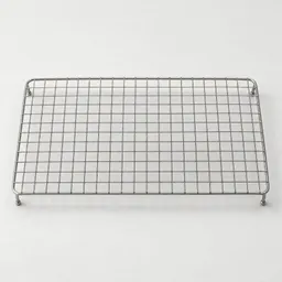Centered rectangular metal wire cooling rack on a light neutral background, shown fully in frame with soft studio lighting.