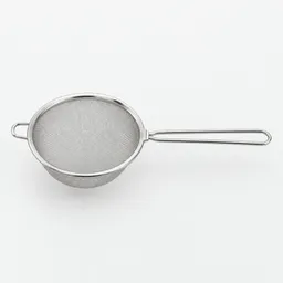 Centered fine-mesh stainless-steel strainer photographed against a neutral light background.