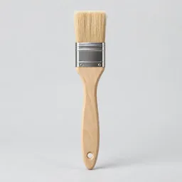 A single unbranded pastry brush with a pale wooden handle, metal ferrule, and soft bristles, centered on a light neutral background.