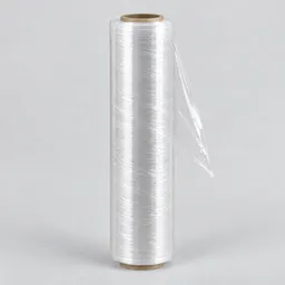 Centered studio photograph of a plain roll of transparent plastic wrap on a light neutral background.
