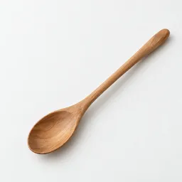 Centered studio photograph of an unbranded long-handled wooden spoon on a neutral light background.