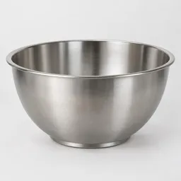 Large brushed stainless steel mixing bowl centered against a light neutral background.