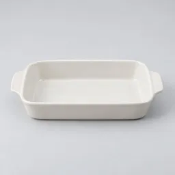 Centered studio photograph of a plain off-white rectangular ceramic baking dish on a light neutral background.