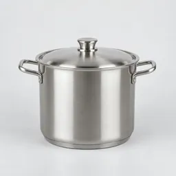 Centered stainless-steel soup pot with a lid and two side handles on a light neutral background.