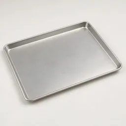 Centered plain silver-gray rectangular sheet pan on a neutral light background.