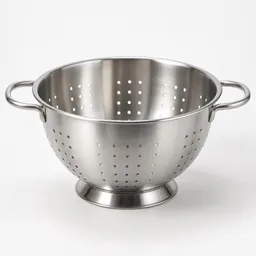 Centered stainless-steel kitchen colander on a light neutral background.