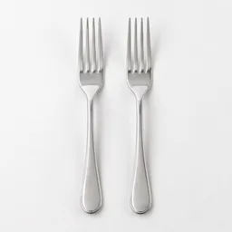 Two stainless-steel dinner forks centered on a neutral light background.